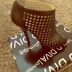 Gently used opened toe booties.